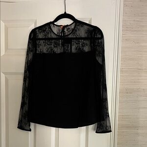 Black evening blouse with lace top in large. Synthetic material.